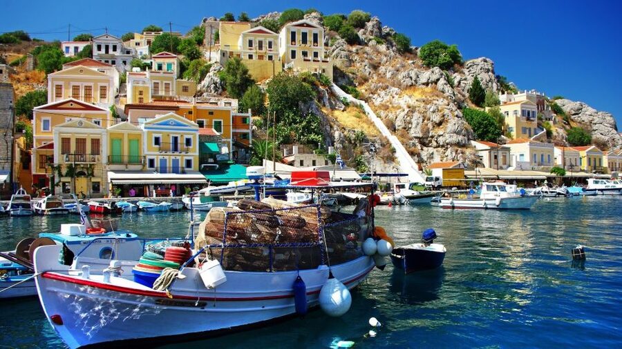 From Rhodes: Boat Trip to Symi Island with Hotel Transfer - Boarding the boat from Rhodes