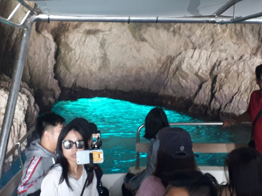 From St.Nikolaos: Boat Cruise to Navagio Beach & Blue Caves - The Blue Caves by glass-bottom boat