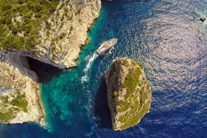 Full-Day Boat Tour of Paxos Antipaxos Blue Caves from Corfu - Mesovrika Beach at Antipaxos