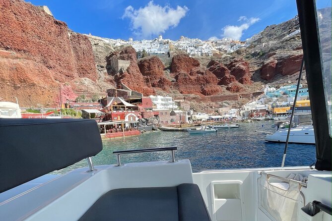 Half Day Premium Catamaran Cruise in Santorini including Oia - Thirassia brings the longest pause