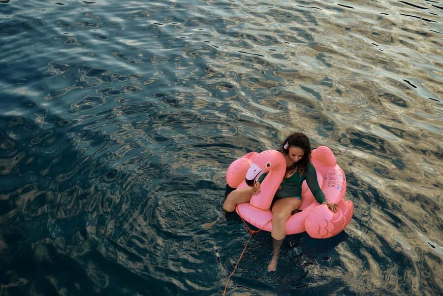 Hersonissos: Sunset Catamaran Cruise with Snacks and Drinks - Snacks, drinks, music, and the social mood