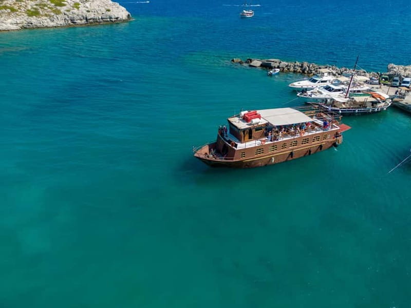Kolympia : Transfer & Cruise to Lindos with 3 Swimming Stops - Boat comfort, shade, toilets, and the paid bar