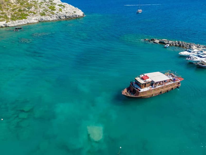 Kolympia : Transfer & Cruise to Lindos with 3 Swimming Stops - Pickup from Kolympia hotels and the Captain Sparrow bus