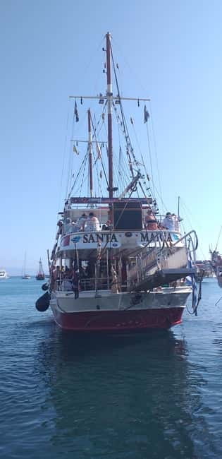 Kos: 3-Island Cruise with Greek BBQ Lunch and Swimming - Dolphin watching near the boat