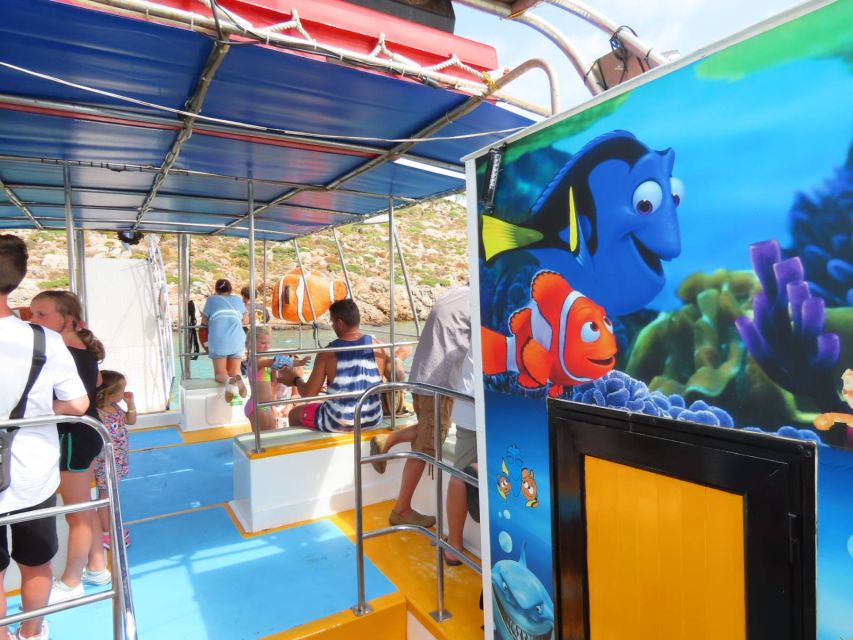 Kos Town: Glass-Bottom Boat Cruise with Swimming Stops - Seeing the shipwreck through the glass