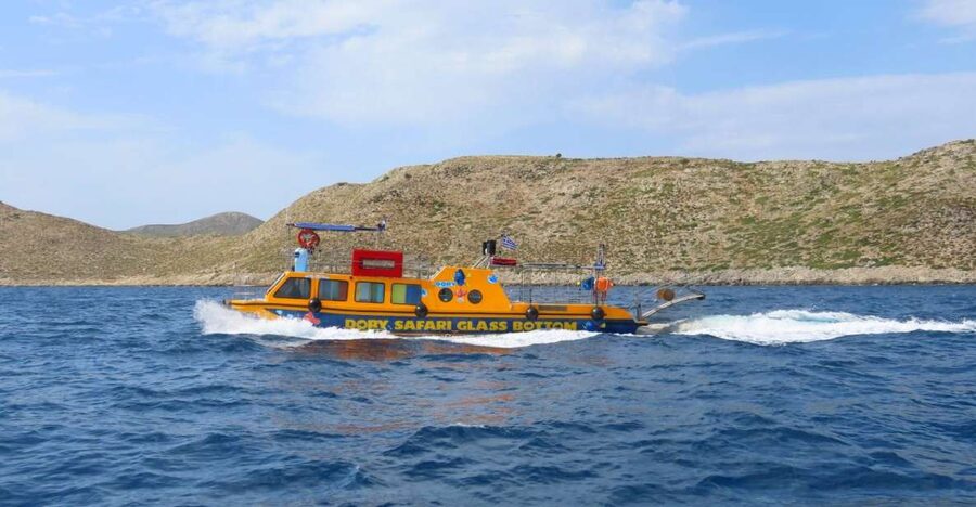 Kos Town: Glass-Bottom Boat Cruise with Swimming Stops - The ride across the Aegean