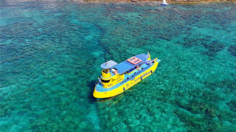 Lindos: Submarine Cruise with Swimming Stop at Navarone Bay - Pickup choices and the return trip