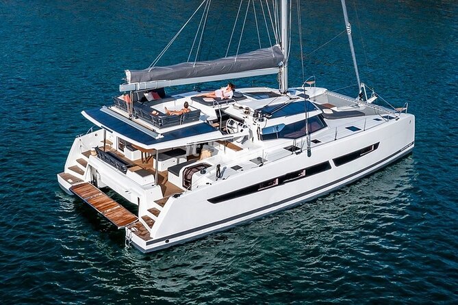 Mykonos: Brand-New Catamaran Cruise with Meal, Drinks & Transport - Aerial and White Coral: room to spread out