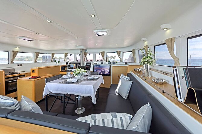 Mykonos Catamaran Premium Day-Sunset Tours 8-flavor Meal & Drinks - The Delos stop is short and weather dependent