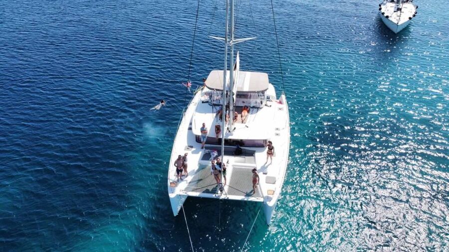 Naxos: Naxos Catamaran Sailing Cruise with Lunch and Drinks - Swimming and snorkeling in clear Mediterranean water
