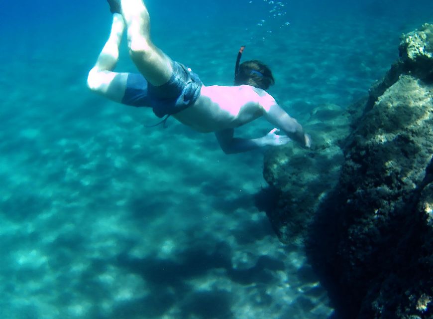 Naxos: Rhina Cave and Coastline Sea Kayaking Tour - Snorkeling in clear Aegean water