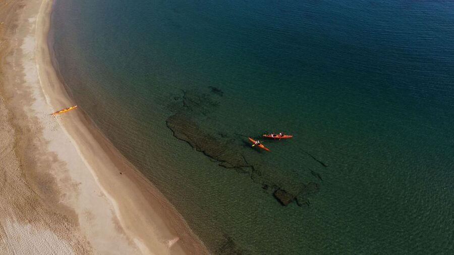 Naxos: Rhina Cave and Coastline Sea Kayaking Tour - Why the eight-person group matters