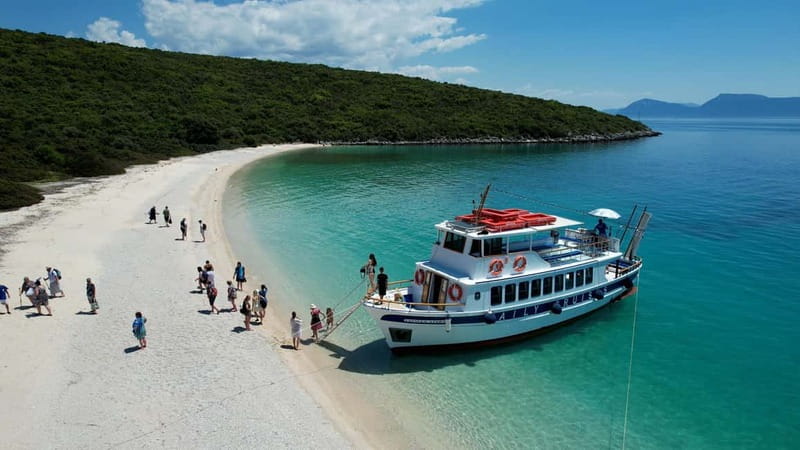 Nydri: Island Hopping Boat Cruise with Beach BBQ Lunch - Skorpios brings a touch of famous-island history