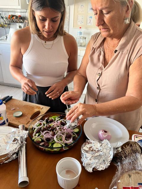 Oia: Greek Cooking Class and Lunch with a Local Grandmother - Preparing a Four-Course Greek Meal