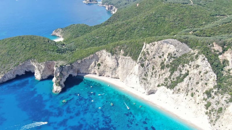 Paleokastritsa: Paradise, Yali Beach, & Blue Caves Boat Tour - The first two sea caves and their changing light
