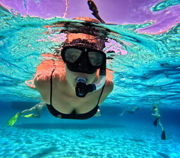 Pounta: Paros & Antiparos Cruise, Swimming & Seafood Lunch - The crew, music, and group atmosphere