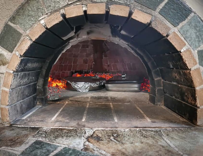 Rethymno: Traditional Cooking Class in a Cretan Village - The wood oven and the main course
