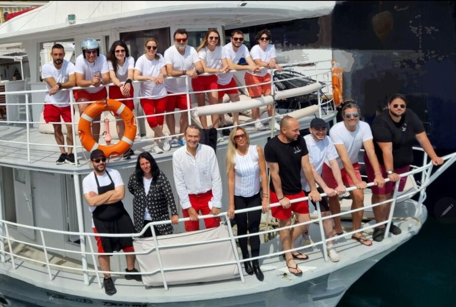 Rhodes: Bay to Bay Swim Cruise with Greek Buffet and Wine - Key points at a glance