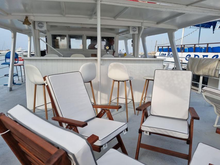Rhodes: Bay to Bay Swim Cruise with Greek Buffet and Wine - A Greek buffet with wine onboard