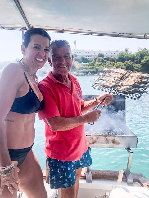 Rhodes: Captain Manolis Fishing Trip with BBQ and Swimming - Swimming and snorkeling near the beach
