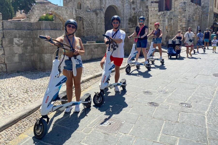 Rhodes: City Highlights and Medieval Town Trikke Tour - Approaching the medieval walls and moat