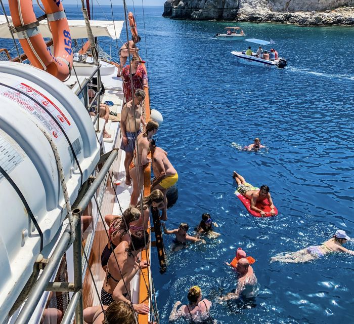 Rhodes: Cruise with 3 Stops, Lunch and Unlimited Drinks - Sun, shade, swimming, and practical comfort