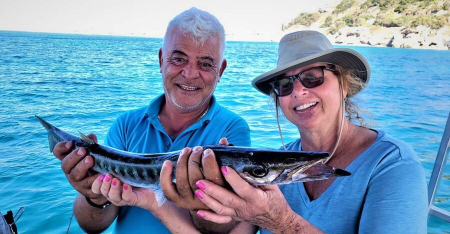 Rhodes: Fishing Trip, Snorkelling, BBQ, & Professional Guide - Two hours of ground fishing