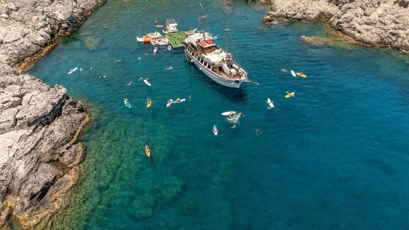 Rhodes: Gulet Trip with Food, Drinks, SUP, Kayak & Swimming - What the six-hour rhythm feels like