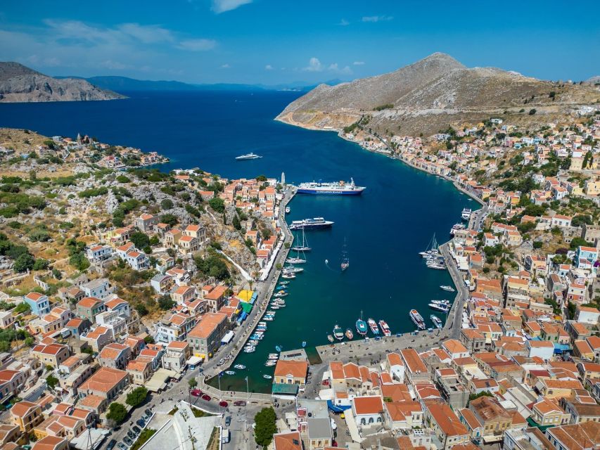 Rhodes: High-Speed Boat to Symi Island and St George's Bay - Arriving at Symi’s picture-perfect harbor