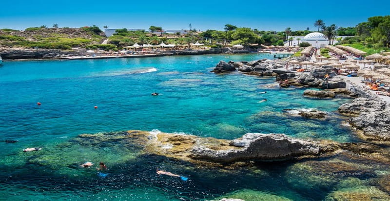 Rhodes: RIB Cruise with Drinks and 4 Swim Stops - Ladiko: turquoise water beside rugged cliffs