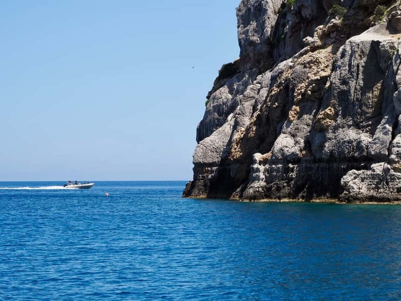 Rhodes: RIB Cruise with Drinks and 4 Swim Stops - The crew makes the small boat work