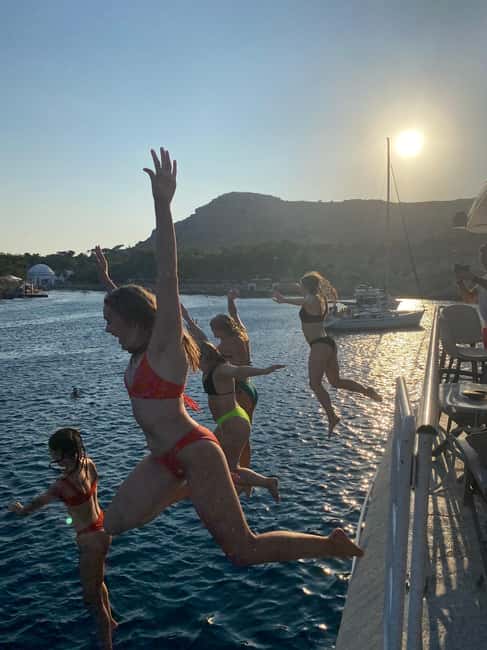 Rhodes: Sunset Cruise w/ Gourmet Buffet, Drinks & Live Music - Kalithea Bay and the late swim