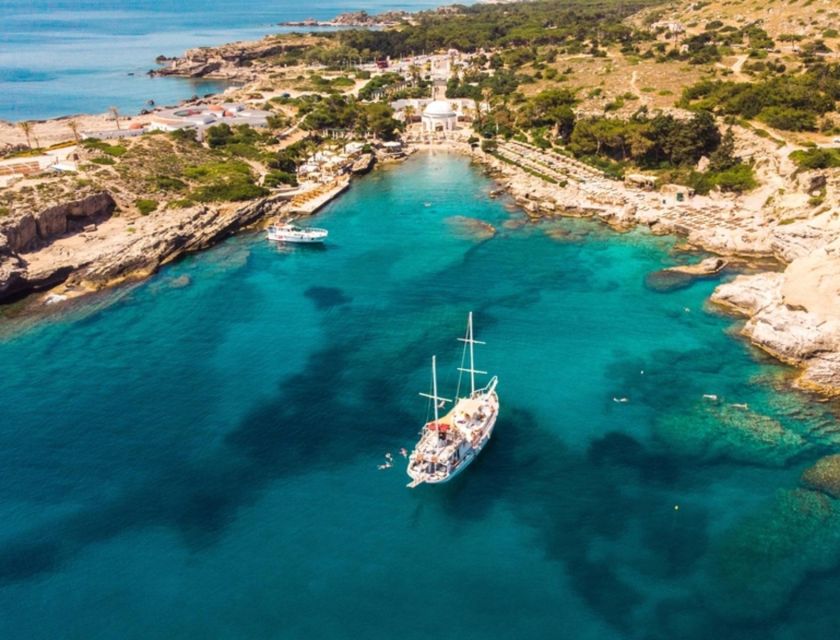 Rhodes: Sunset Cruise w/ Gourmet Buffet, Drinks & Live Music - Leaving Rhodes with Mandraki views