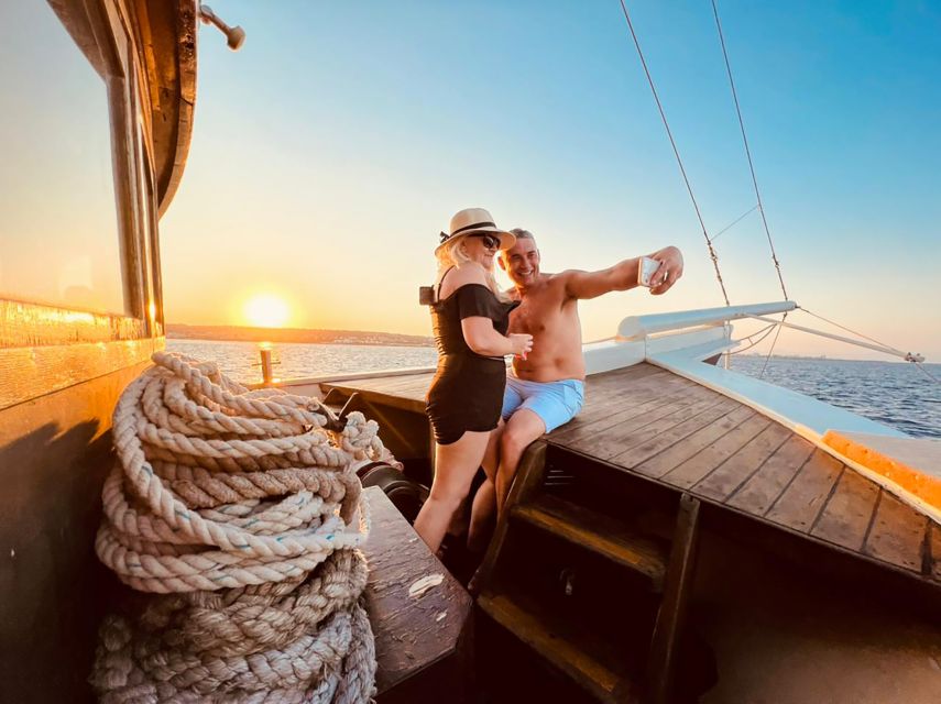 Rhodes: Sunset Cruise with Greek BBQ and Unlimited Drinks - Setting out from Mandraki Harbour