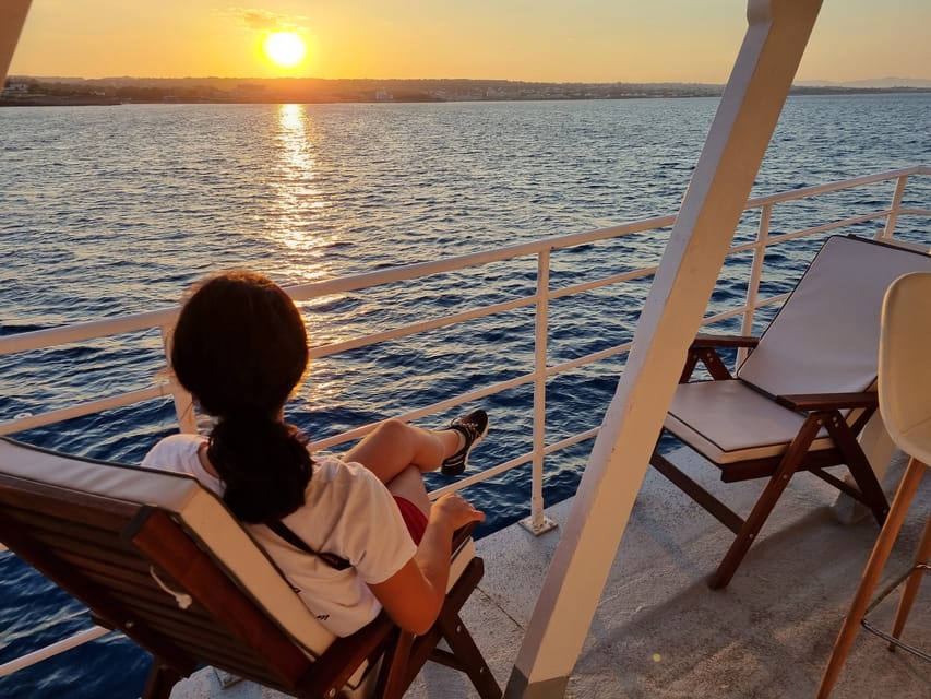 Rhodes: Sunset Cruise with Live Music, Wine & Greek Buffet - Returning to Mandraki around 9pm