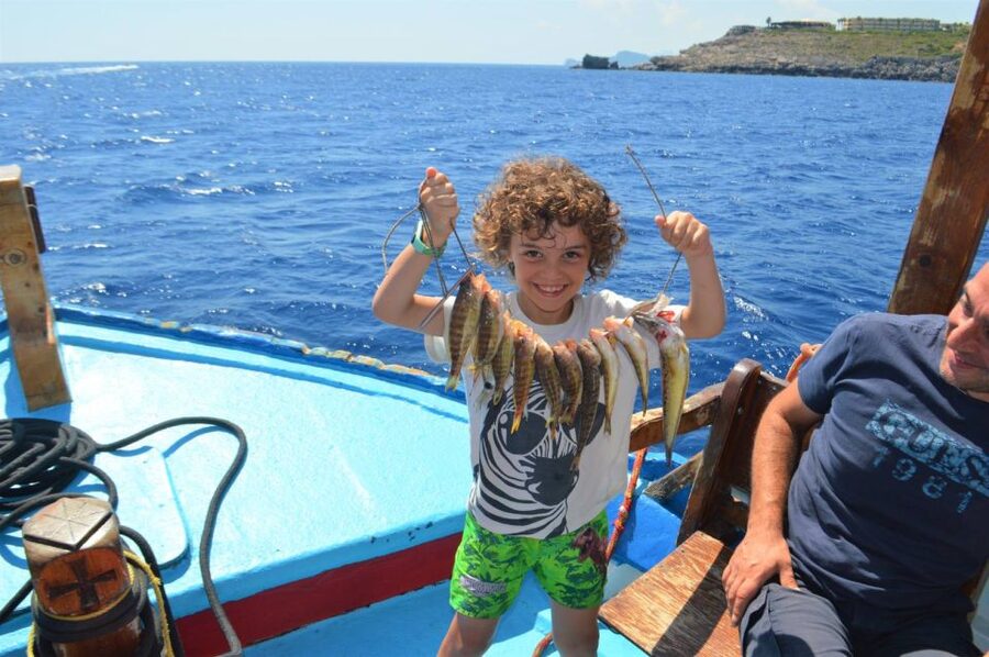 Rhodes Town: Fishing Boat Trip with Fish Meal and Swim Stops - Fishing across several Rhodes sea spots