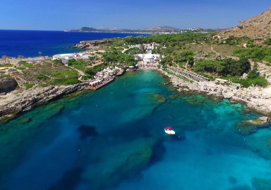 Rhodes Town: Fishing Boat Trip with Fish Meal and Swim Stops - A swim and snorkel stop in a secluded cove