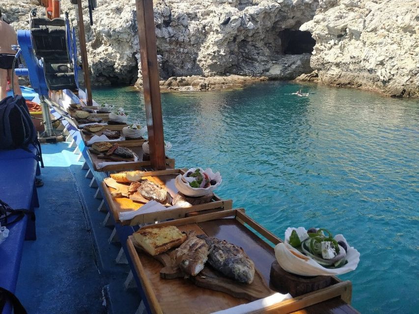 Rhodes Town: Fishing Boat Trip with Fish Meal and Swim Stops - Who will get the most from this $76 trip