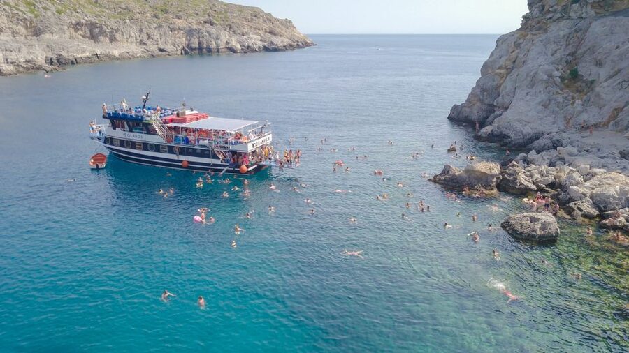 Rhodes Town: Scenic Cruise to Lindos with Swim Stops - The east coast views and the first swim