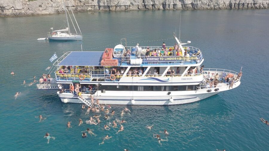 Rhodes Town: Scenic Cruise to Lindos with Swim Stops - Pickup and return transport across Rhodes