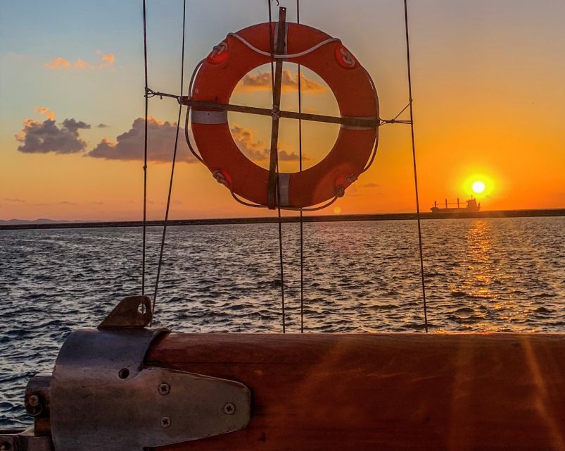 Rhodes Town: Sunset Boat Cruise with Drinks & Snacks - Sailing back as the sky changes color