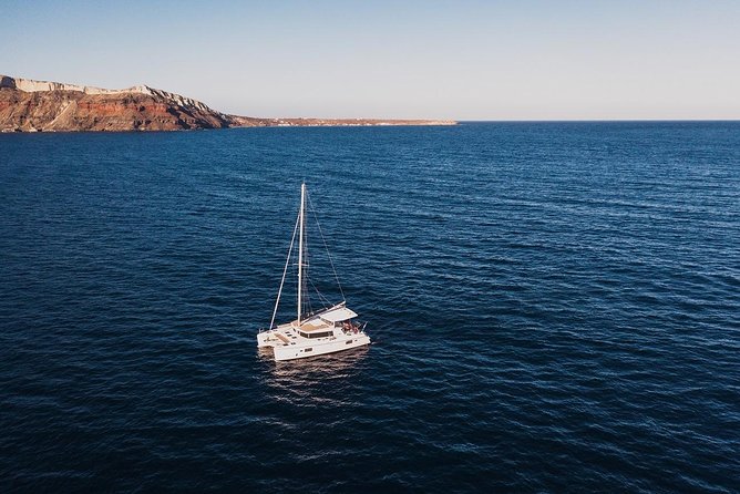 Romantic Sunset Catamaran Caldera Cruise incl. Meal & Drinks - The Hot Springs stop: volcanic water, modest expectations