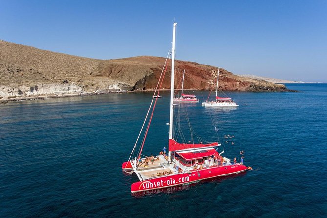 Sailing Catamaran Cruise in Santorini with BBQ, Drinks and Transfer - Leaving Ammoudi or Athinios Port