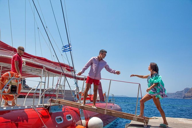 Sailing Catamaran Cruise in Santorini with BBQ, Drinks and Transfer - What the boat experience is really like