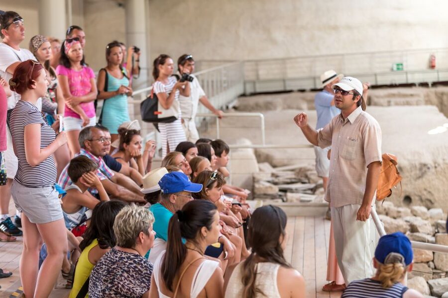 Santorini: Akrotiri Prehistoric City Guided Walking Tour - Walking through a city preserved under pumice
