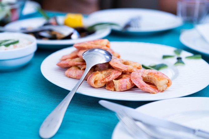 Santorini All-inclusive Catamaran Cruise with Thirassia Stop - Lunch, drinks, and the social side of the boat