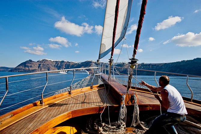 Santorini Caldera Sunset Sailing Cruise with Dinner and Wine - Sunset near Oia from the open sea