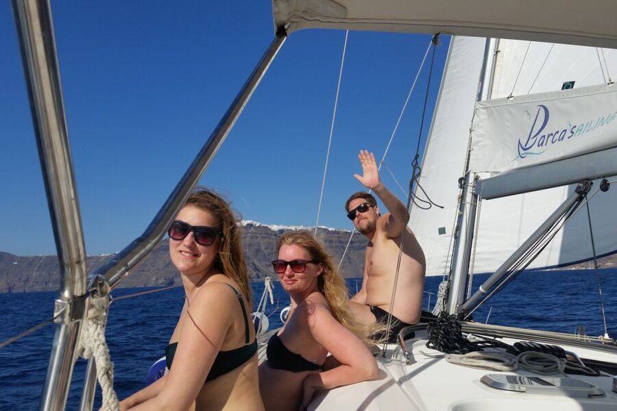 Santorini Caldera: Sunset Sailing Cruise with Meal - Indian Rock, the Lighthouse, and sailing inside the caldera