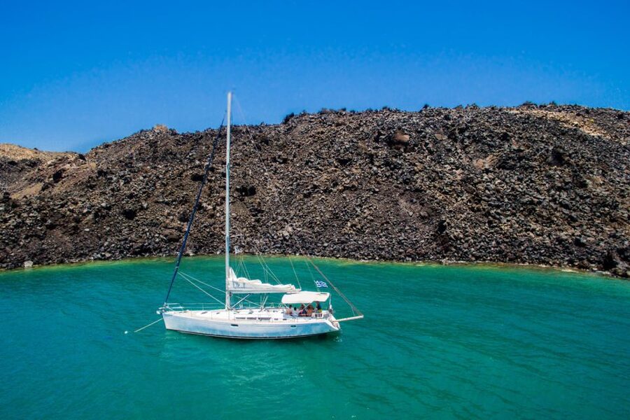 Santorini Caldera: Sunset Sailing Cruise with Meal - Palea Kameni and the warm volcanic waters