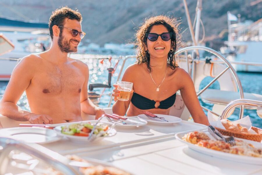 Santorini Caldera: Sunset Sailing Cruise with Meal - Sunset on the return route